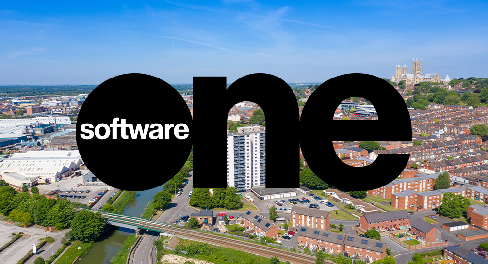 One software logo with a city in the background.