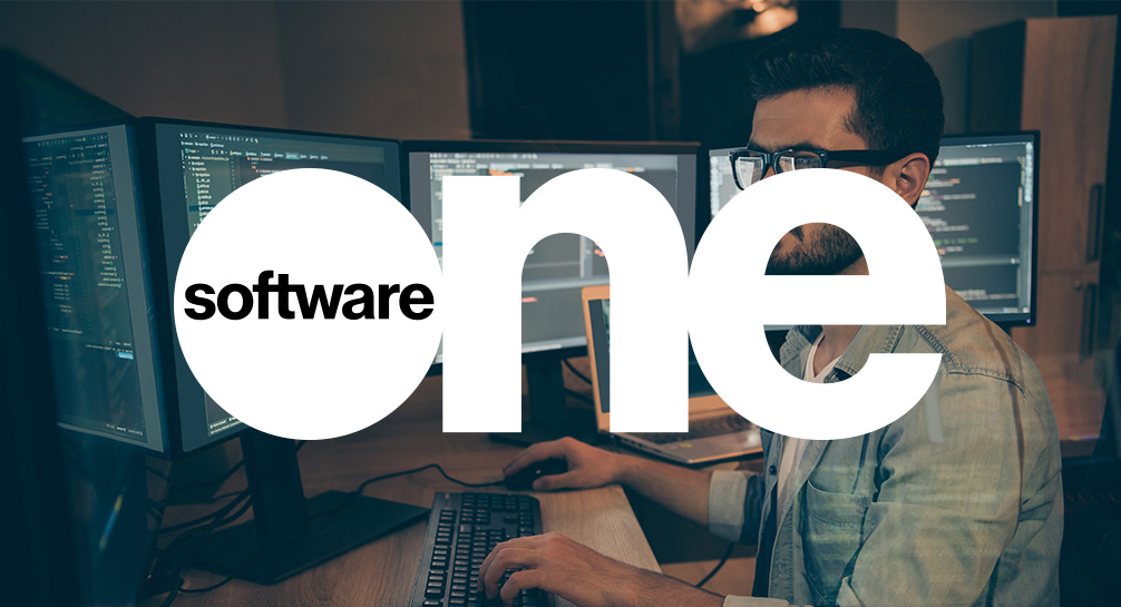 Software one logo with a man working at a computer.