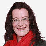 A woman wearing glasses and a red scarf.